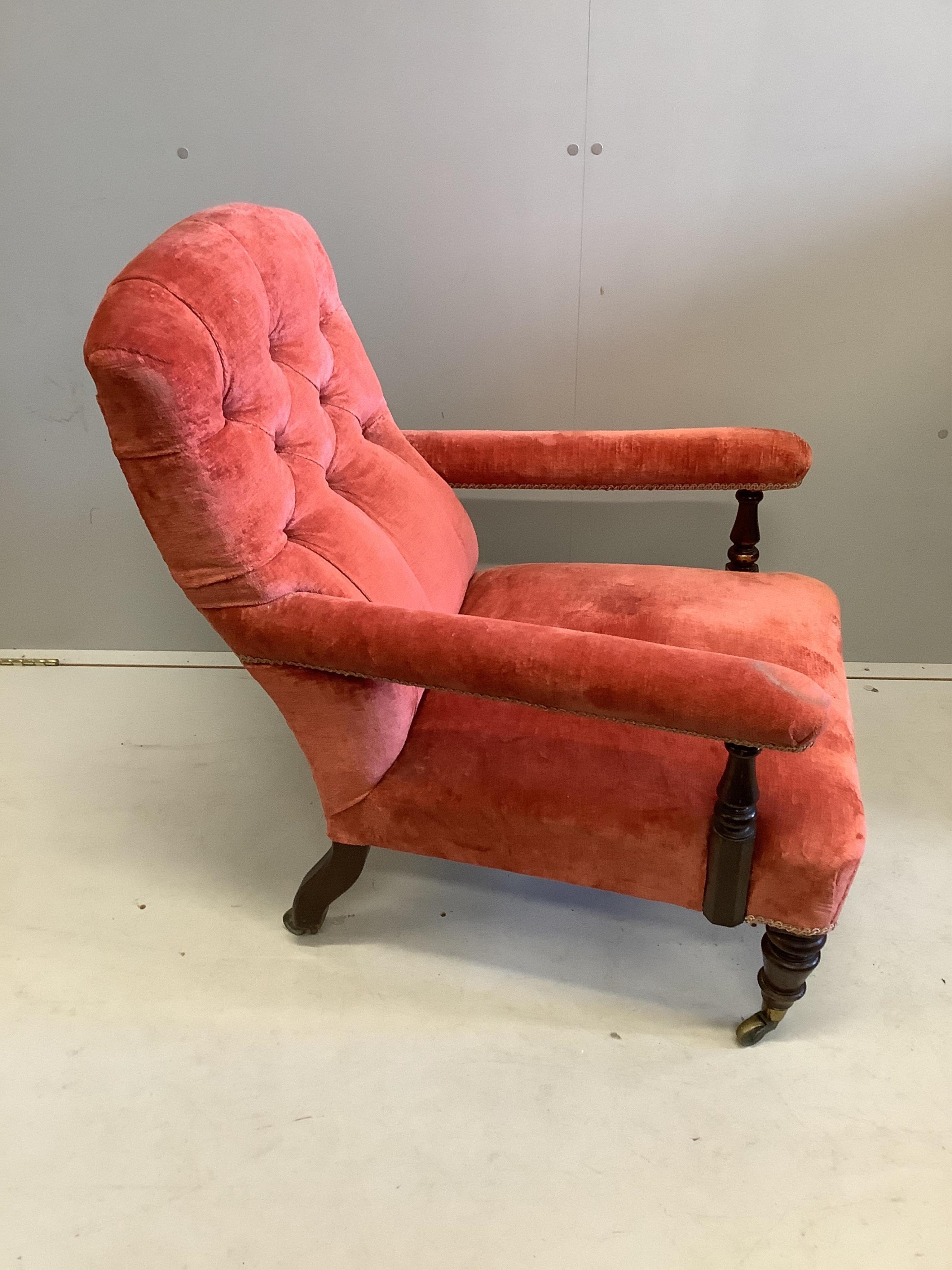 A Victorian upholstered open armchair, width 64cm, depth 84cm, height 88cm